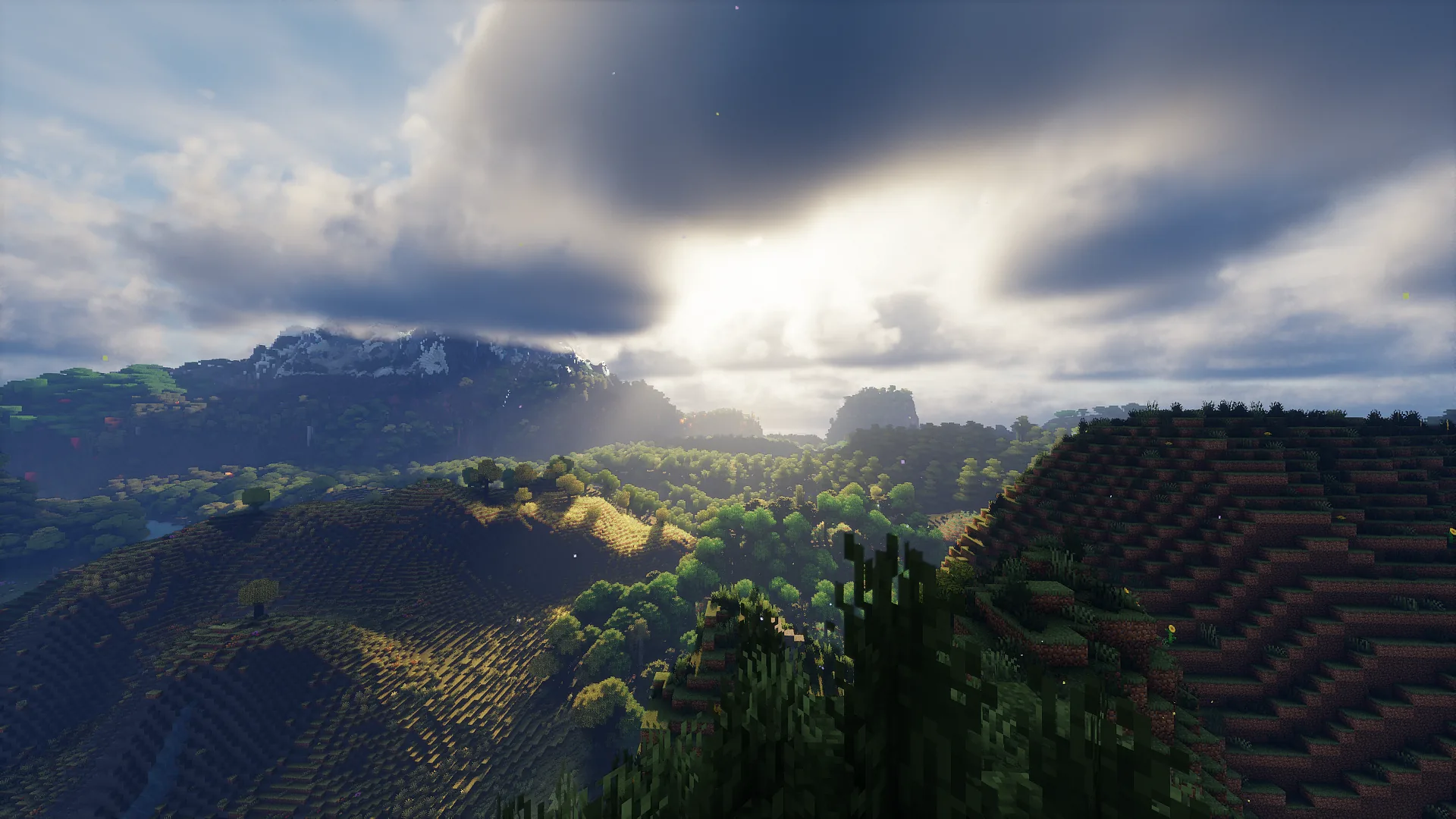 Green EarthCraft valley under dramatic clouds